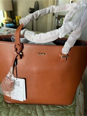 Lovevook tote bag with matching accessory bags. Three bags total.
